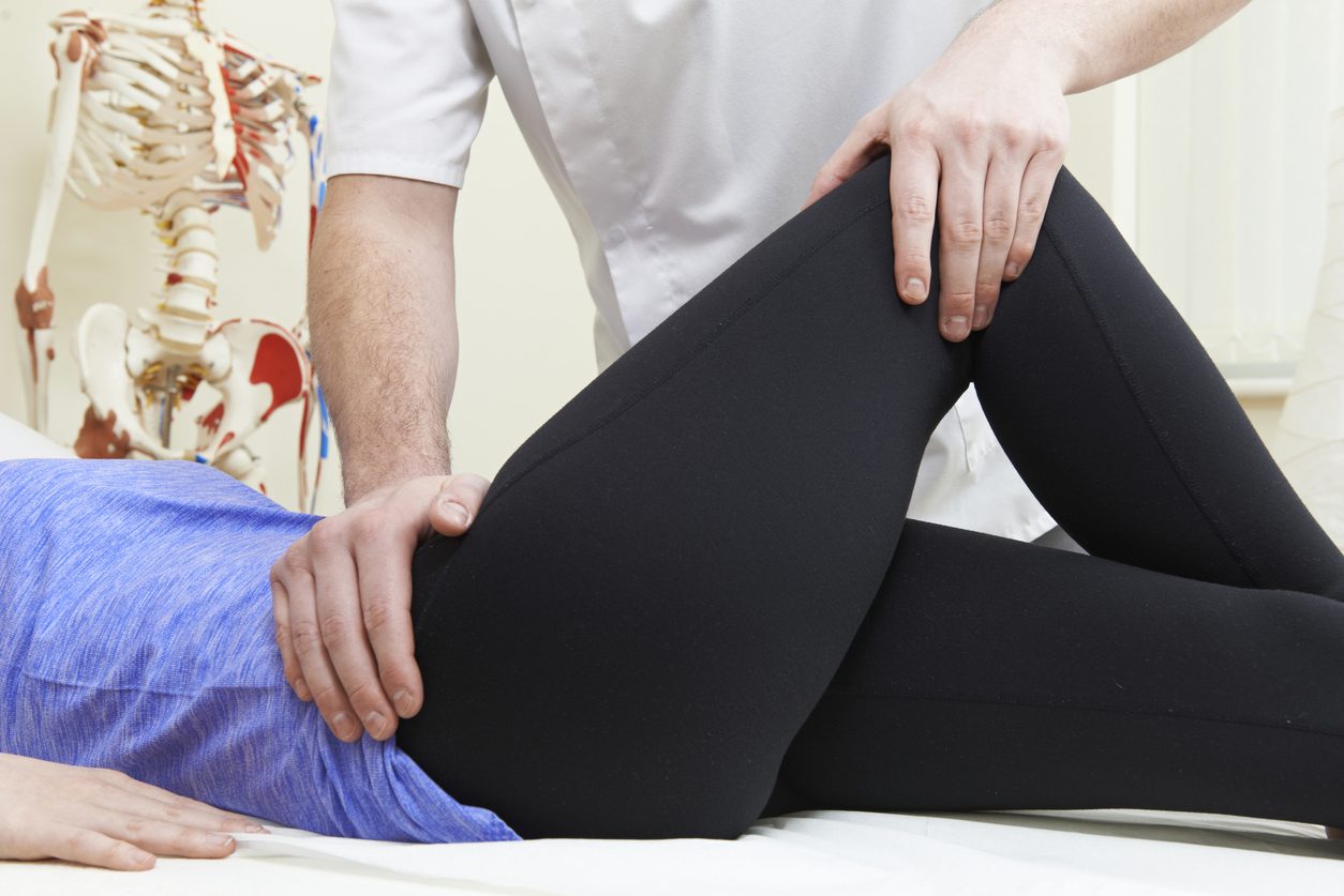 Physical therapist administers technique for relieving hip pain