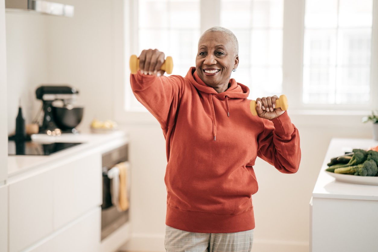 Active older patient using physical therapy exercises to stay fit