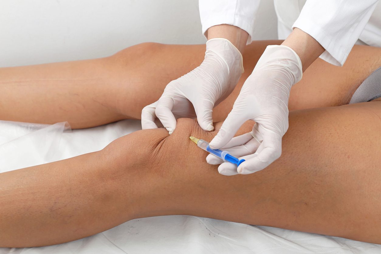 Patient receiving injection before surgery
